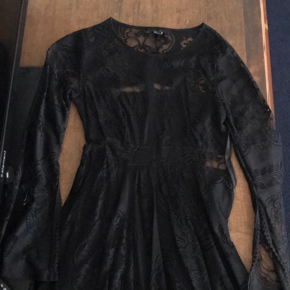 Black lace dress with bell bottom sleeves